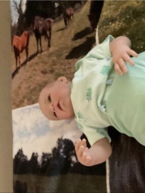 Reborn Baby Doll in Light Mint Outfit with Small Prints